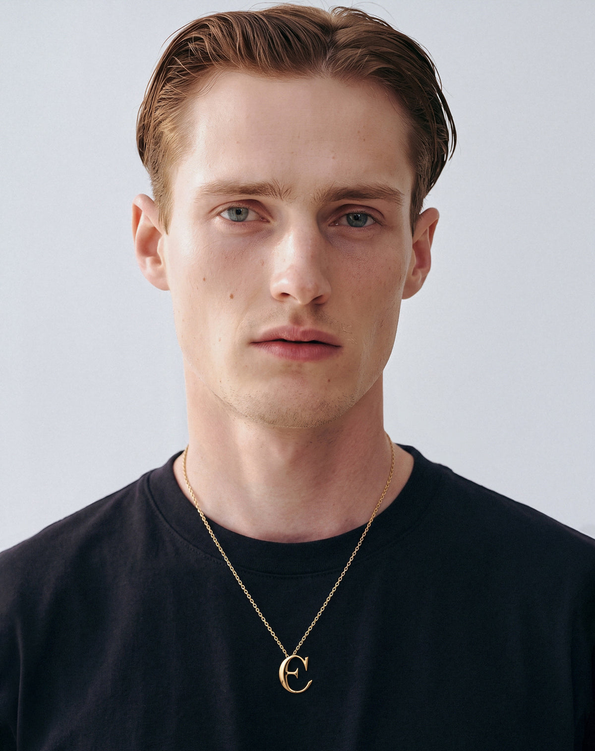 Narbut Pendant «Є» Gold-Plated slide 2