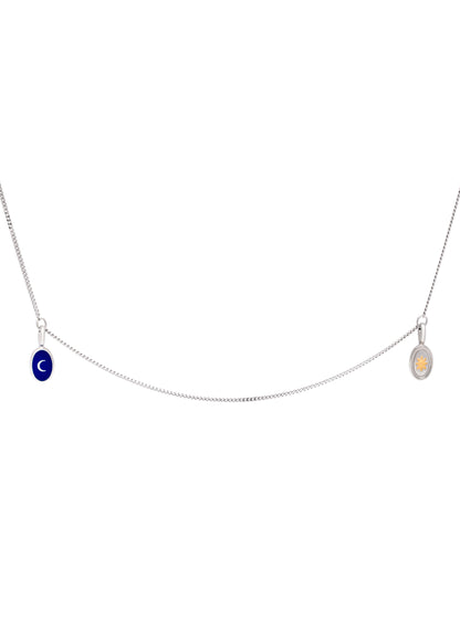 Silver pendants with a star and moon