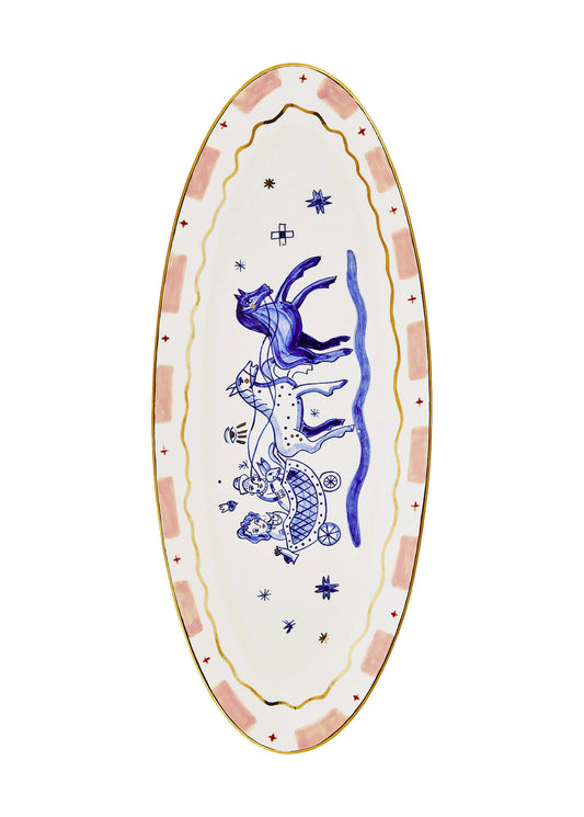 Oval plate with the image of sledding