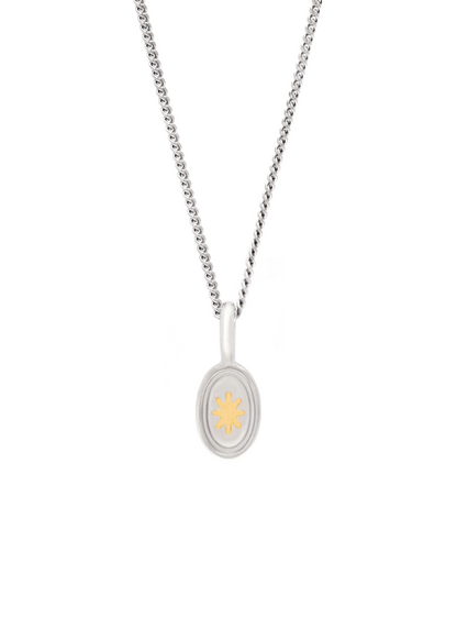 Silver pendants with a star and moon